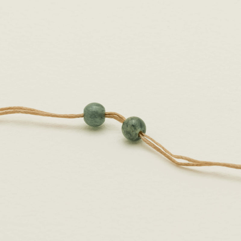 NZ Greenstone Disc Pendant on Natural Cord - Necklace - Walker & Hall