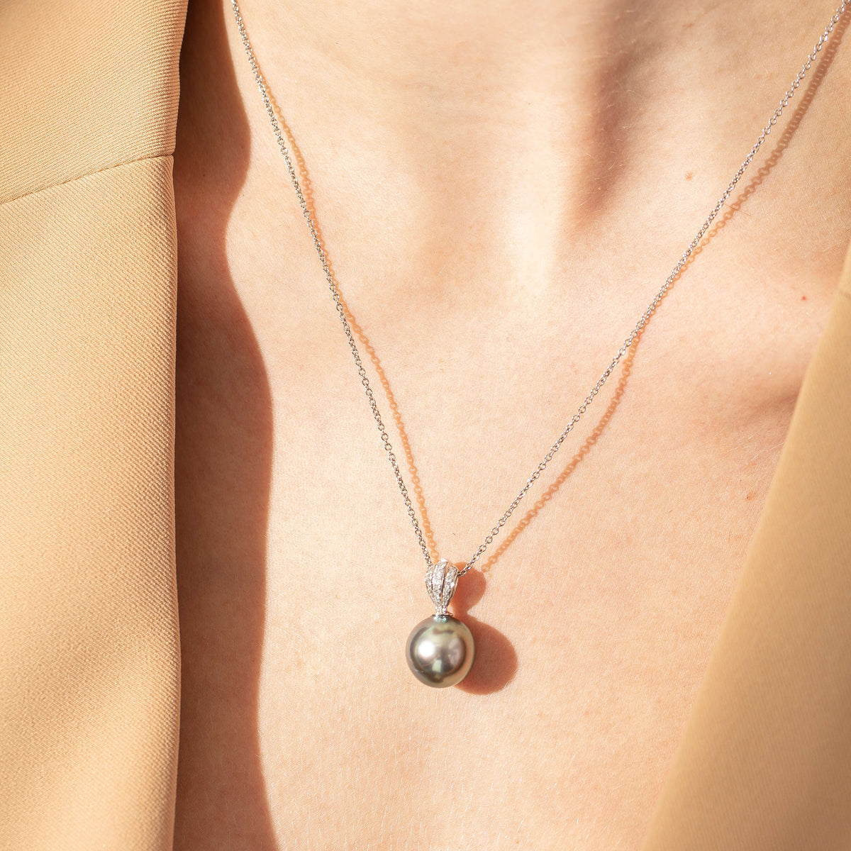 Model wearing Tahitian Pearl & Natural Diamond Pendant