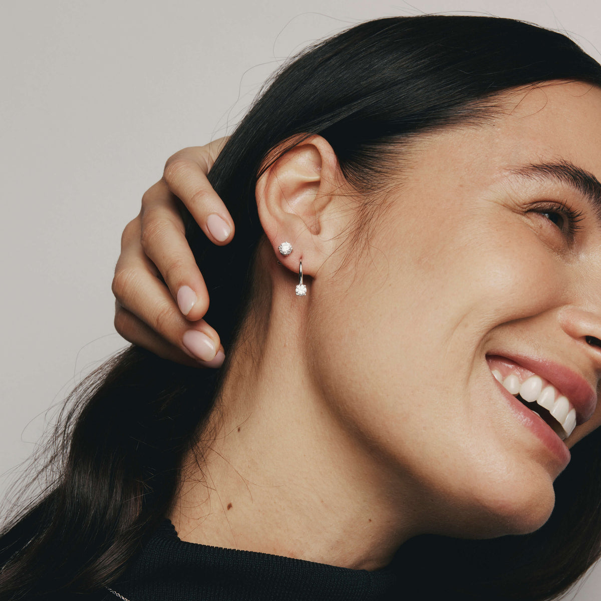 Model wearing natural diamond Blossom Studs and Blossom Drop Earrings